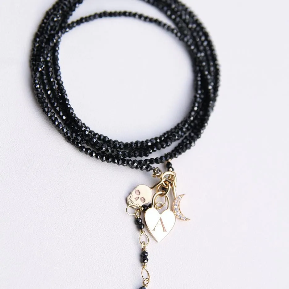 14K GOLD MIDI BITTY SKULL CHARM